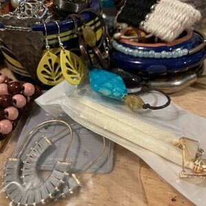 Blue and yellow trinket dish with fun jewelry